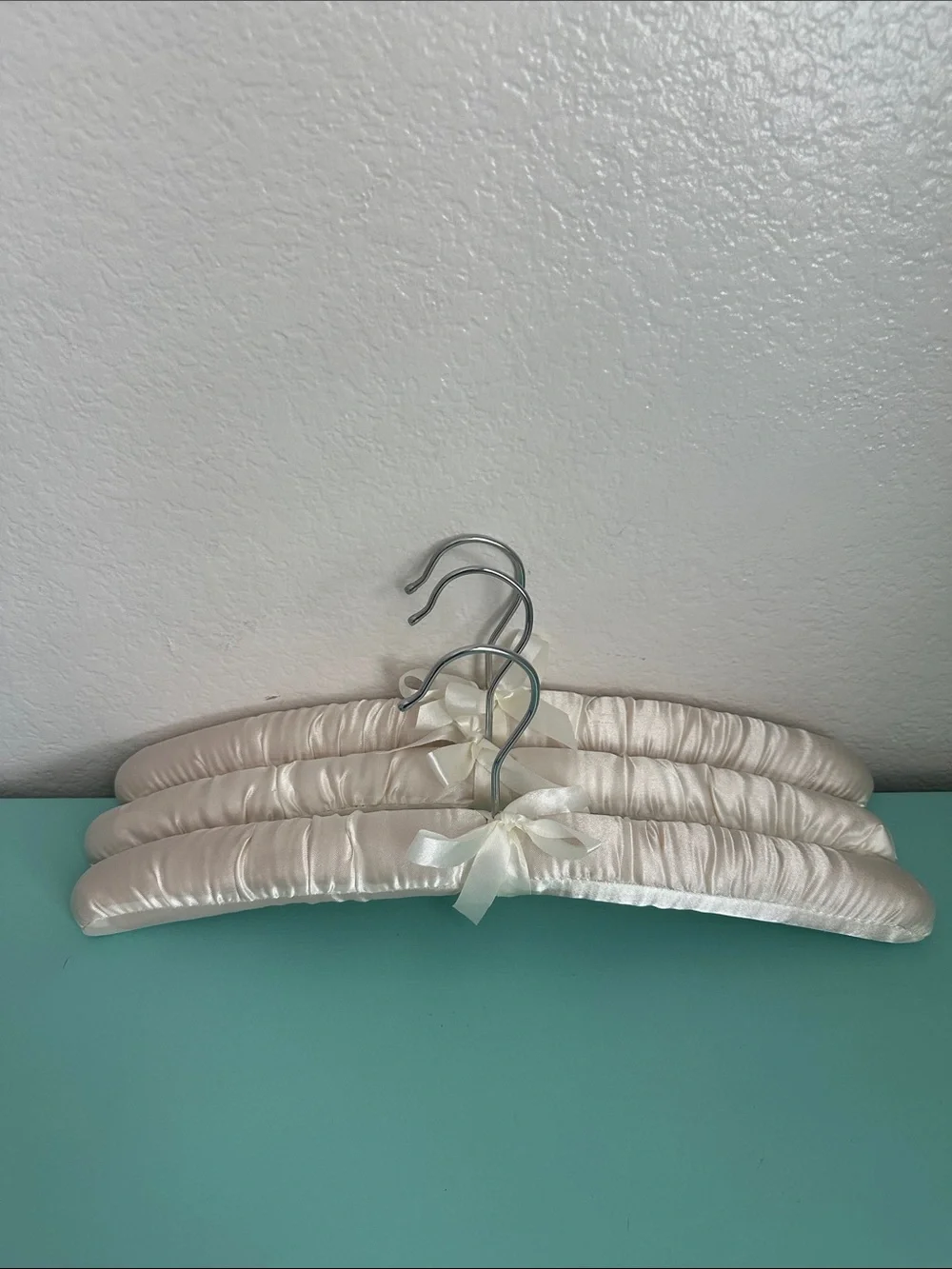 Satin padded heavy duty hangers-set of 3ct.-glossy ivory color & silver hook-new